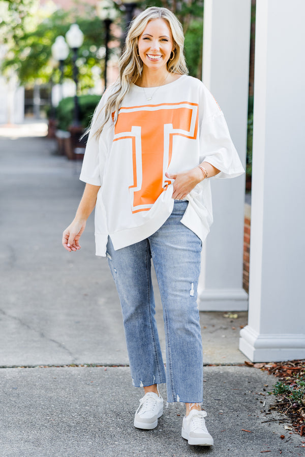 Chic Soul plus size clothing, short-sleeve off-white tee with scoop-neckline and orange graphic capital 