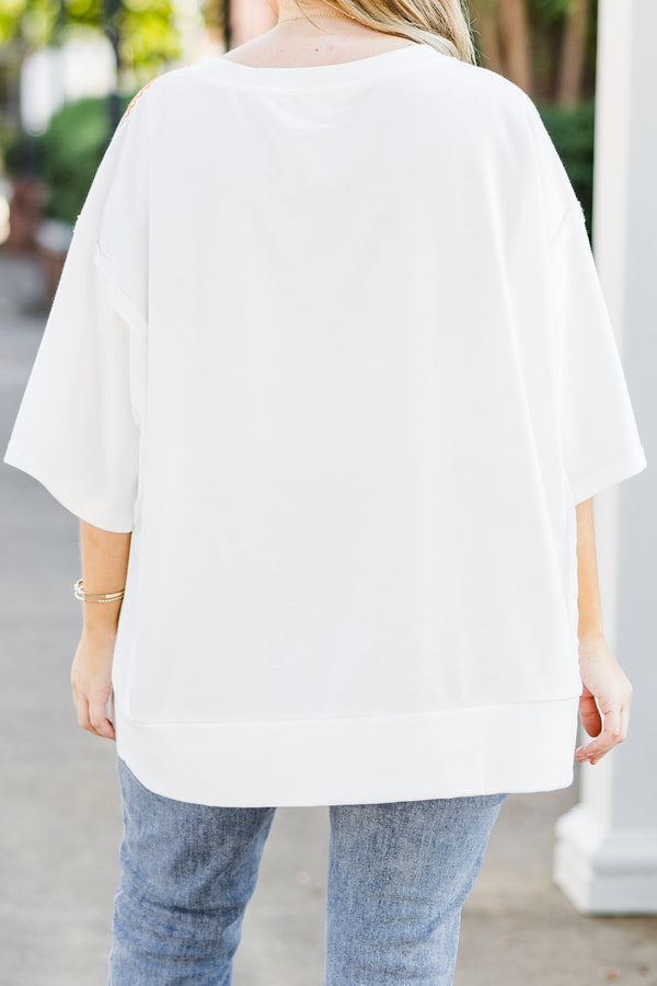 Chic Soul plus size clothing, short-sleeve off-white tee with scoop-neckline and orange graphic capital 