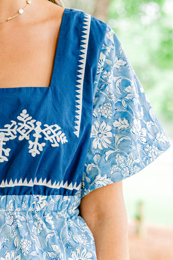 Chic Soul plus size clothing, baby blue short-flutter sleeve square neckline top with white floral pattern and solid navy blocking around shoulders with white embroidery