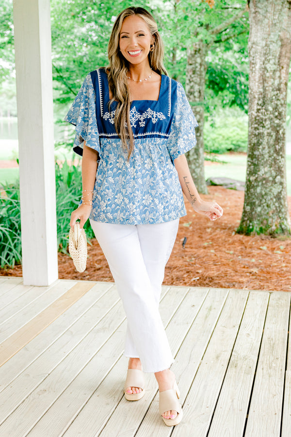 Chic Soul plus size clothing, baby blue short-flutter sleeve square neckline top with white floral pattern and solid navy blocking around shoulders with white embroidery