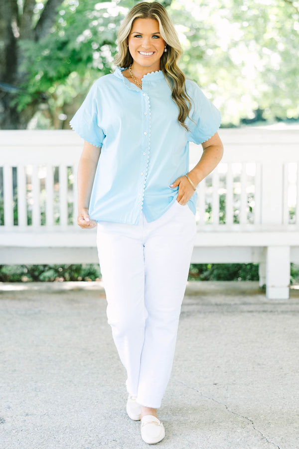 Plus size light blue button-front cotton blouse with scalloped trim on the neckline and sleeves.