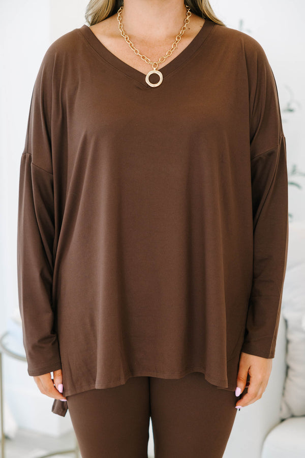 Plus Size chocolate brown lounge set with an oversized long sleeve v-neck top and matching leggings.