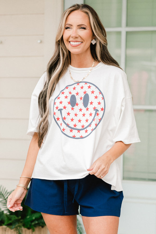 Chic Soul plus size clothing, White short sleeve tee with a smiley face graphic on the center of the shirt that is filled with red stars
