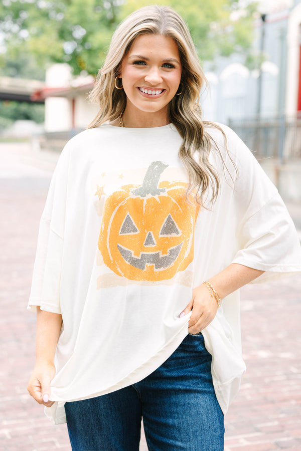 Ivory oversized boyfriend tee with a happy pumpkin graphic 