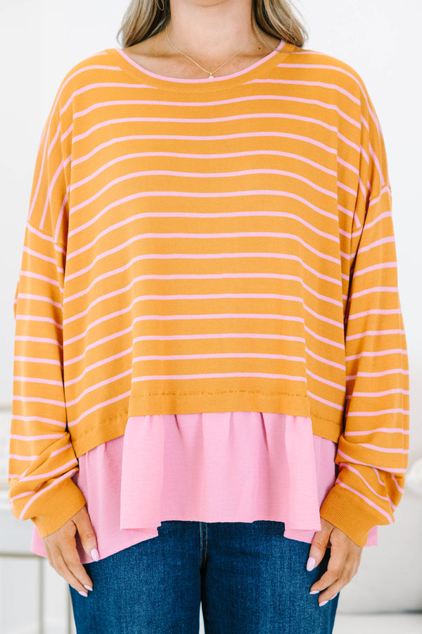 Chic Soul plus size clothing, brown long sleeve top with thin light pink horizontal stripes and a light pink ruffle hem