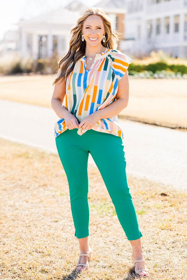 Chic Soul plus size clothing, orange block vertical stripe pattern top with v neck with ruffle along neckline and flare ruffle short sleeves