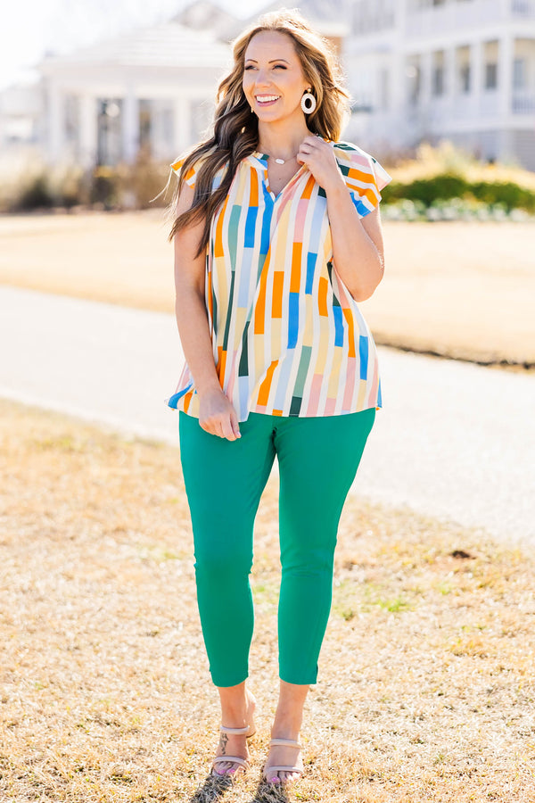 Chic Soul plus size clothing, orange block vertical stripe pattern top with v neck with ruffle along neckline and flare ruffle short sleeves