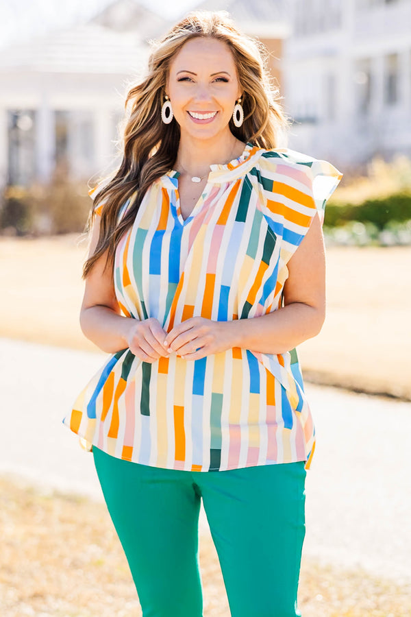 Chic Soul plus size clothing, orange block vertical stripe pattern top with v neck with ruffle along neckline and flare ruffle short sleeves
