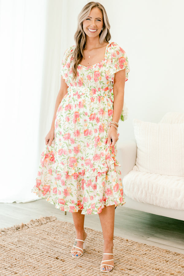 Chic Soul plus size clothing, pink short sleeve midi dress with short flutter sleeves with sweetheart neckline with cinched waist with ruffle detail long bottom with large pink floral pattern