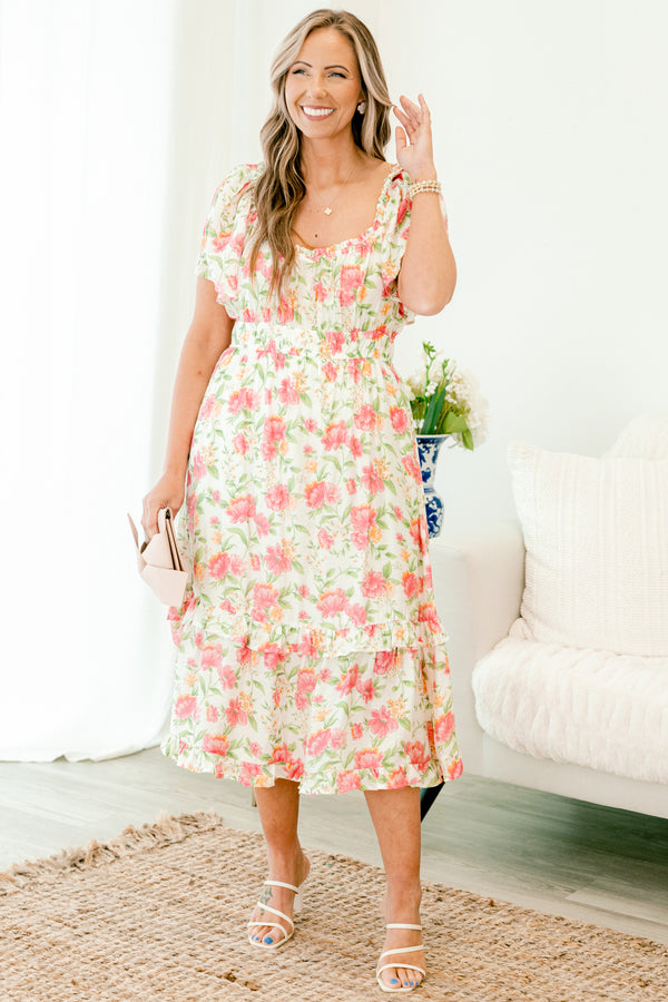 Chic Soul plus size clothing, pink short sleeve midi dress with short flutter sleeves with sweetheart neckline with cinched waist with ruffle detail long bottom with large pink floral pattern