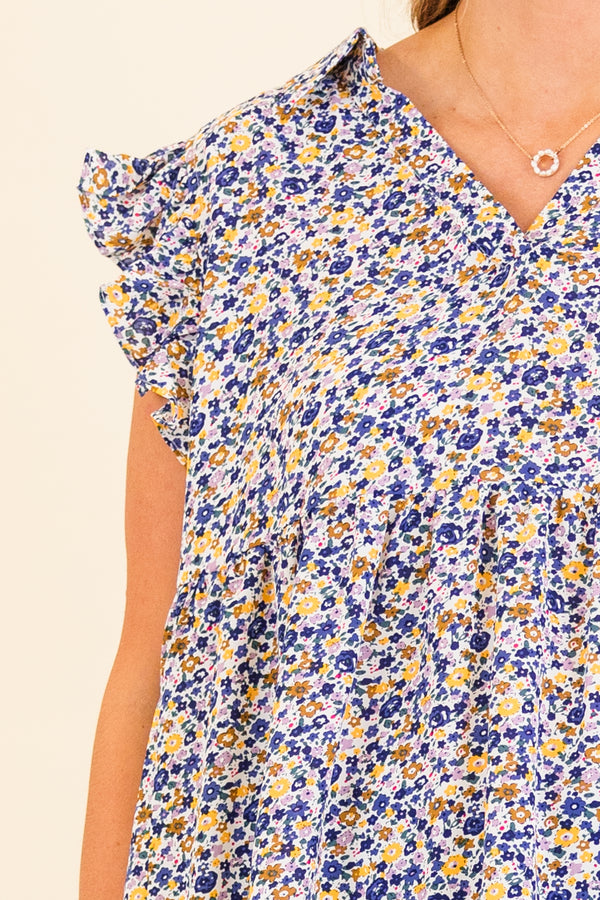 Chic Soul plus size clothing, short-sleeve blue combo top with ruffled sleeves and v-neckline with small blue and yellow floral spotted pattern