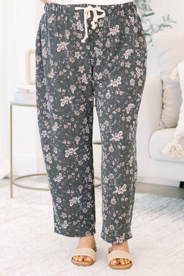 Plus Size black floral corduroy pants with a wide leg fit and drawstring waist.