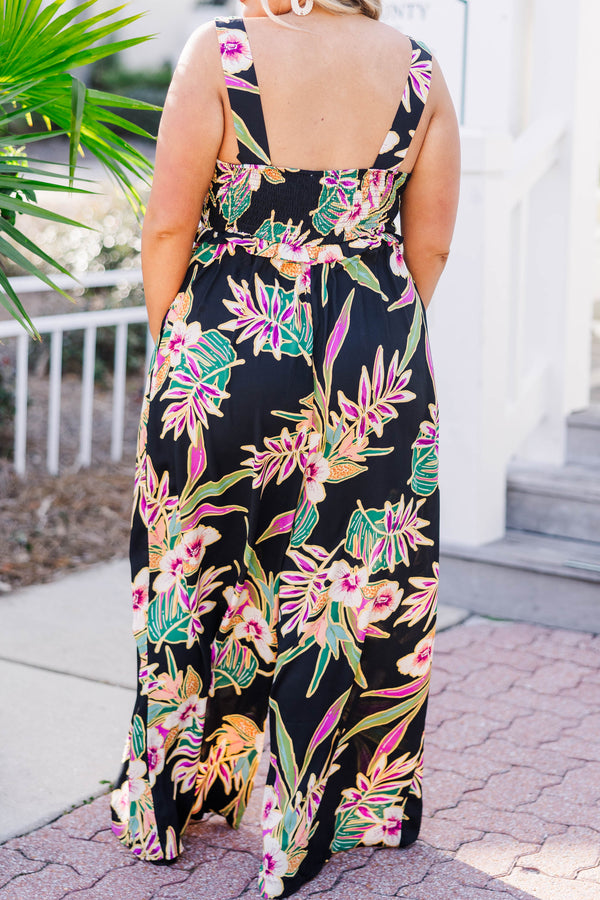 Chic Soul plus size clothing, black sleeveless jumpsuit with scoop neckline and synched waist with multicolor tropical print