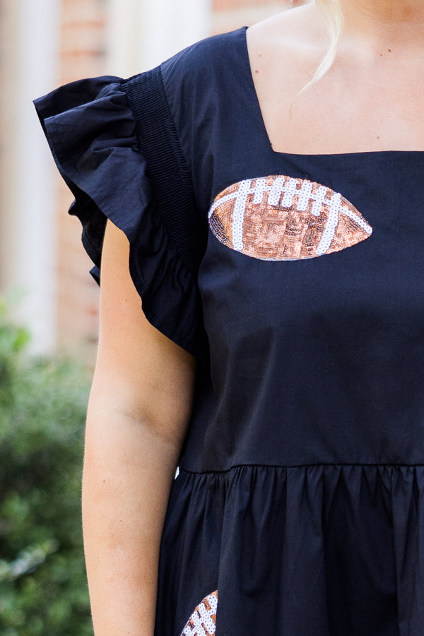 Chic Soul plus size clothing, short-flutter-sleeve black ruffled baby doll dress with brown sequined football patches scattered across dress with square neck-line