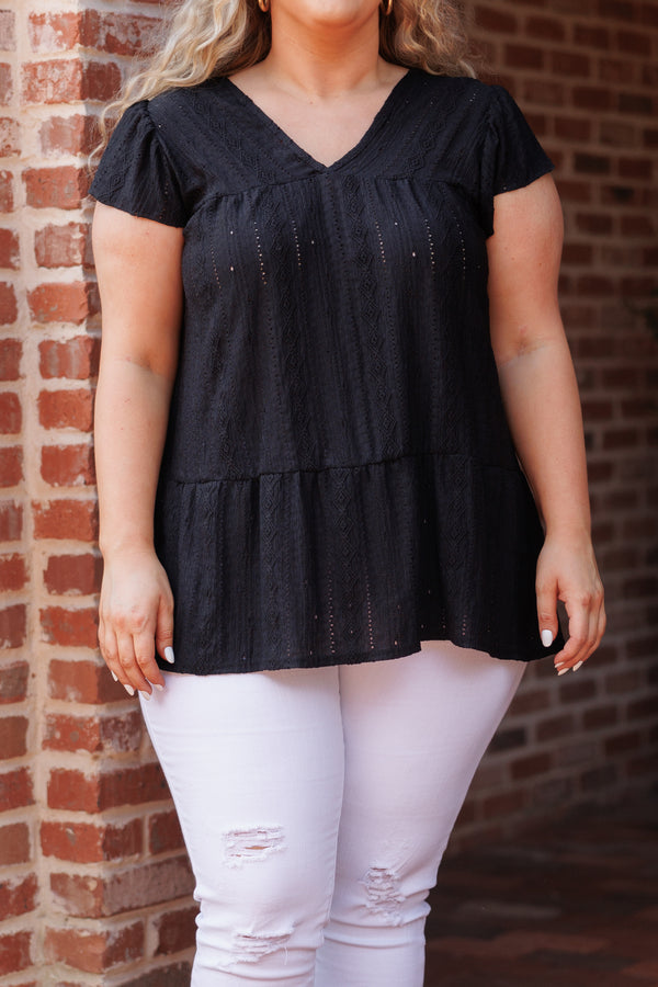 Chic Soul plus size clothing, black textured short sleeves top with ruffle hemline and a v neck