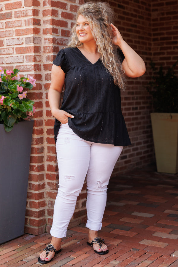 Chic Soul plus size clothing, black textured short sleeves top with ruffle hemline and a v neck