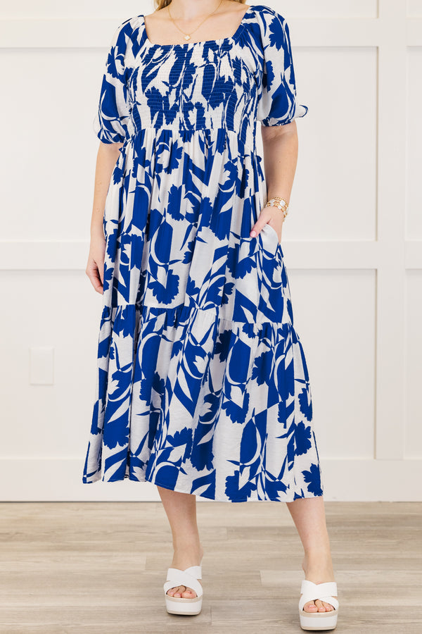 Chic Soul plus size clothing, short-puffed-sleeve ruffled royal blue midi dress with a smocked bodice and a square-neckline with an abstract floral blue and white pattern 