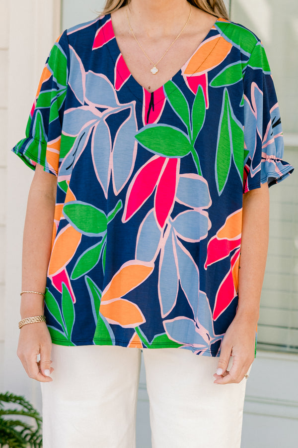Chic Soul plus size clothing, short-sleeve navy fuchsia top with a v-neckline and a multi-colored tropical floral pattern