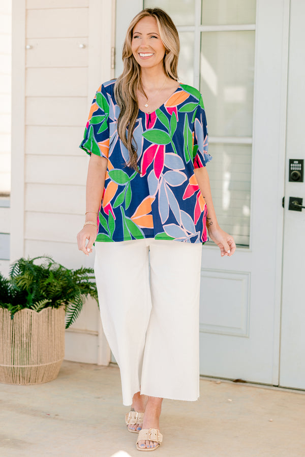 Chic Soul plus size clothing, short-sleeve navy fuchsia top with a v-neckline and a multi-colored tropical floral pattern