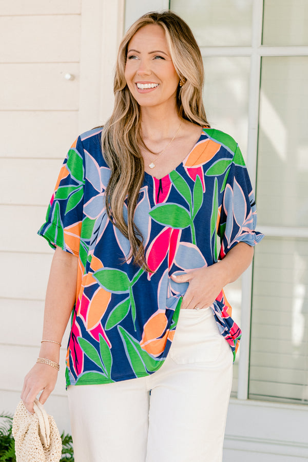 Chic Soul plus size clothing, short-sleeve navy fuchsia top with a v-neckline and a multi-colored tropical floral pattern