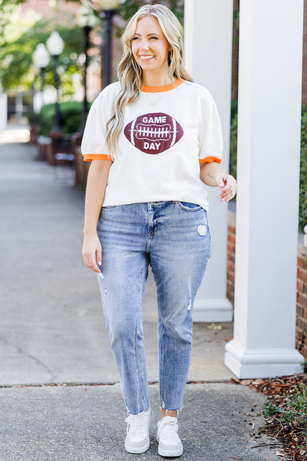Chic Soul plus size clothing, white short sleeve knit top with orange trim along round neckline and puff sleeves with brown football graphic with 