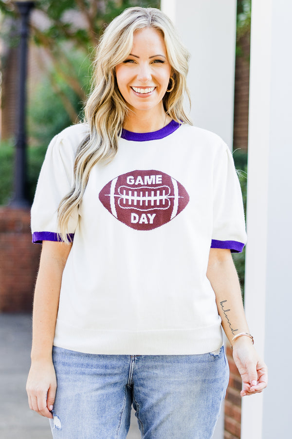 Chic Soul plus size clothing, white short sleeve knit top with purple trim along round neckline and puff sleeves with brown football graphic with 