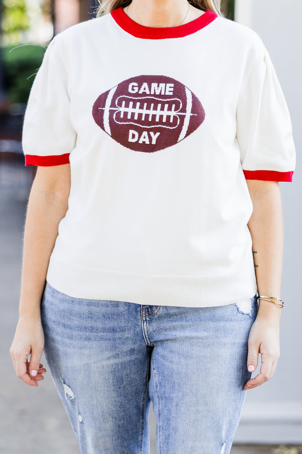 Chic Soul plus size clothing, white short sleeve knit top with red trim along round neckline and puff sleeves with brown football graphic with 