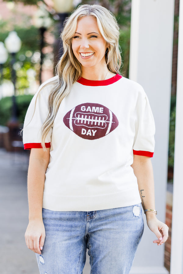 Chic Soul plus size clothing, white short sleeve knit top with red trim along round neckline and puff sleeves with brown football graphic with 
