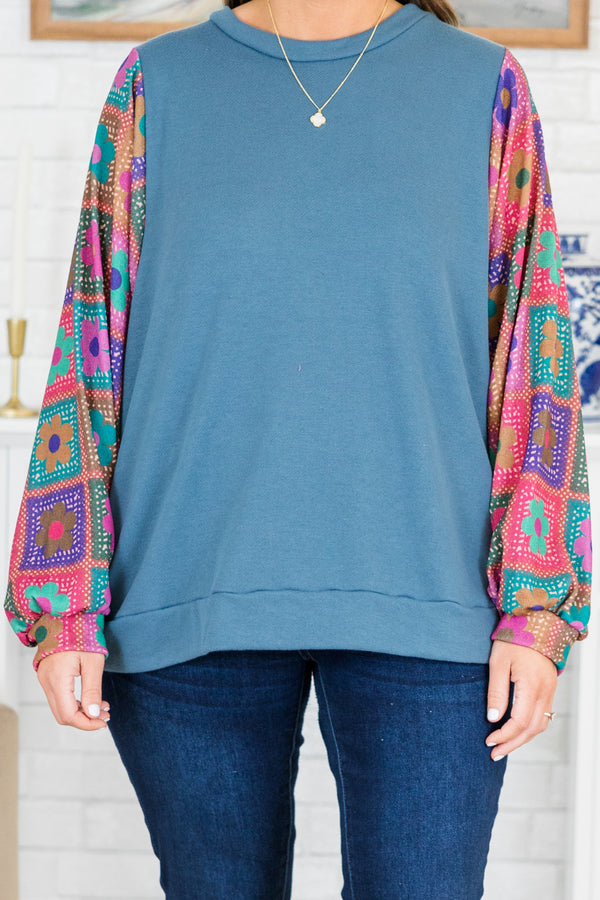Chic Soul plus size clothing, slate blue long sleeve top with round neckline with floral multicolor abstract sleeves with cuff detail 