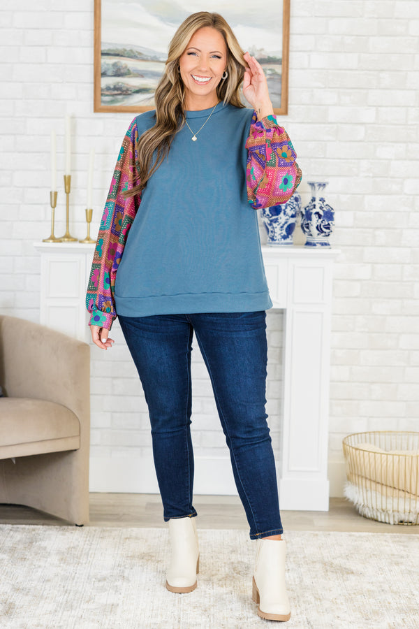 Chic Soul plus size clothing, slate blue long sleeve top with round neckline with floral multicolor abstract sleeves with cuff detail 