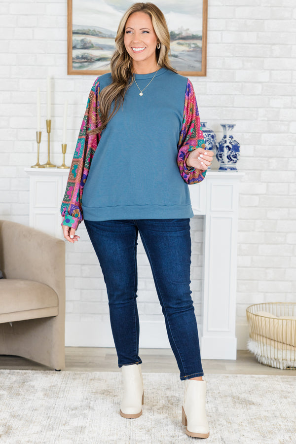 Chic Soul plus size clothing, slate blue long sleeve top with round neckline with floral multicolor abstract sleeves with cuff detail 