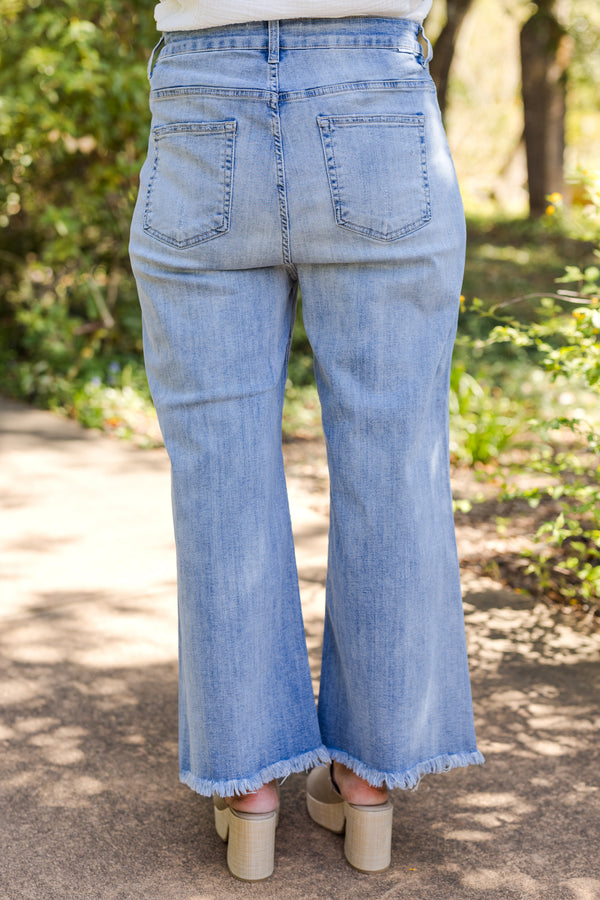chic soul plus size clothing, Light wash jeans with front pockets and a fringed detail at the end of the pant leg 