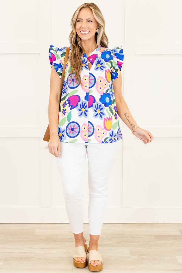 Chic Soul plus size clothing, flutter-sleeve blue top with a split-v-neckline and a geometric multi-colored floral pattern 
