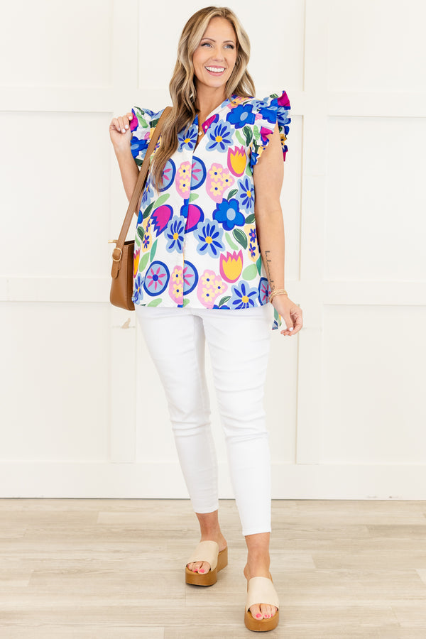 Chic Soul plus size clothing, flutter-sleeve blue top with a split-v-neckline and a geometric multi-colored floral pattern 