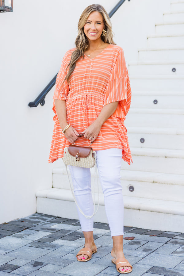 Chic Soul plus size clothing, orange short sleeve poncho top with cinched waist with tie detail with v neckline and flowy sleeves with white striped pattern
