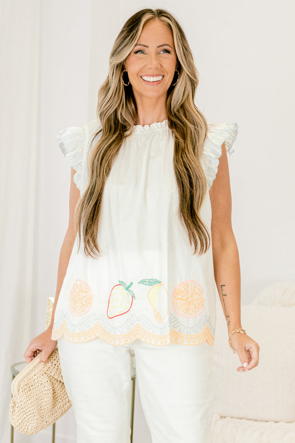 Chic Soul plus size clothing, white top with flutter sleeves and stitching details or fruit and various patterns along the bottom of the top 