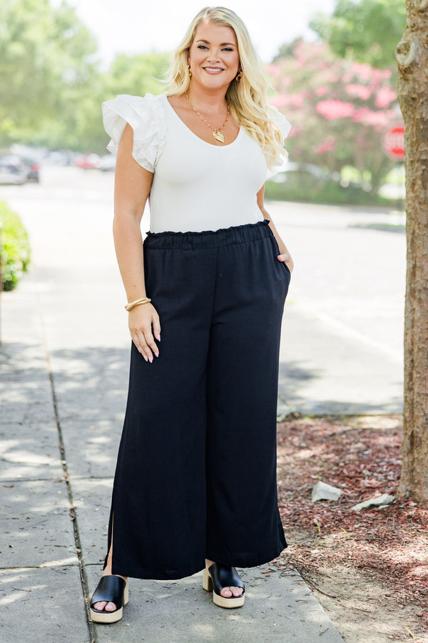 Chic Soul plus size clothing, black flowy pants with ruched stretchy waist and pockets plus small slit along calf