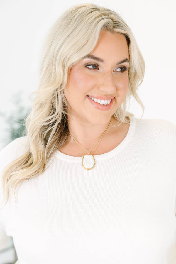 Plus Size gold chain necklace featuring an organic-shaped ivory stone pendant with a gold border.