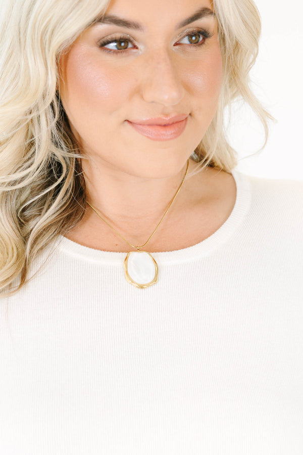 Plus Size gold chain necklace featuring an organic-shaped ivory stone pendant with a gold border.