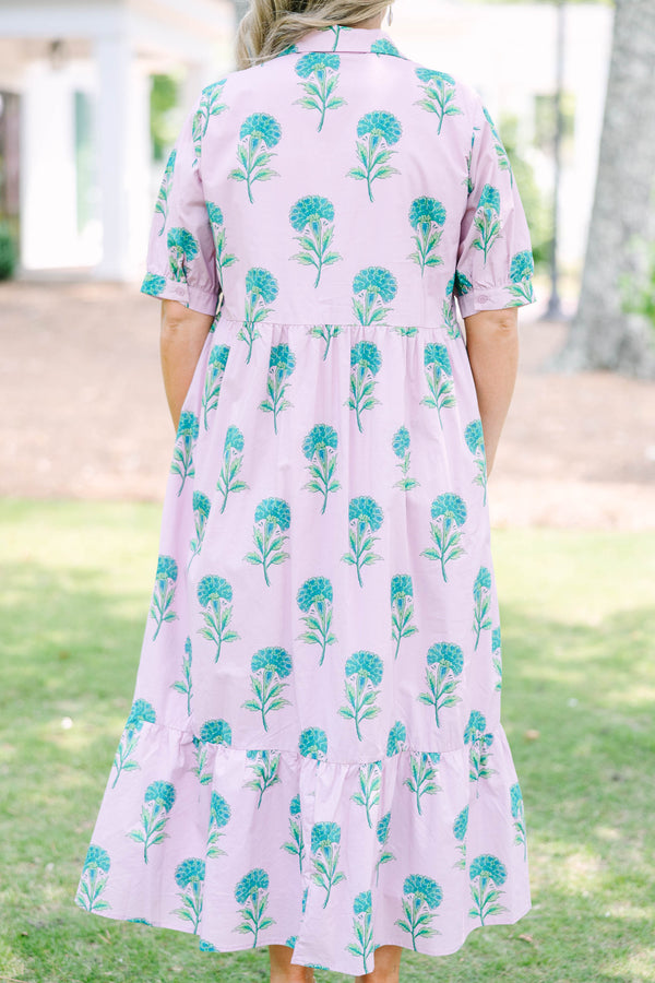 Plus Size light pink midi dress with a green floral print, button-up front, and tiered skirt.