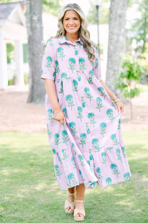 Plus Size light pink midi dress with a green floral print, button-up front, and tiered skirt.