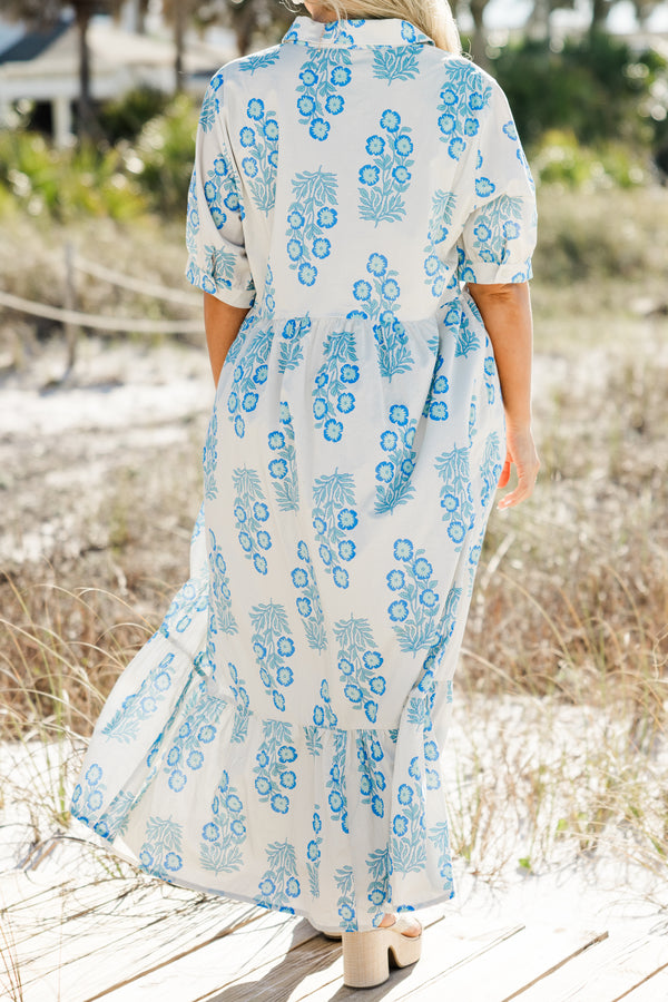 Chic Soul plus size clothing, short-sleeve collared buttoned off white ruffled baby doll maxi dress with a sky blue floral abstract pattern