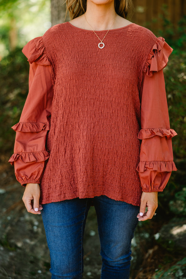 Chic Soul plus size clothing, rust colored long sleeve top with ruffle details on the sleeves and shoulders