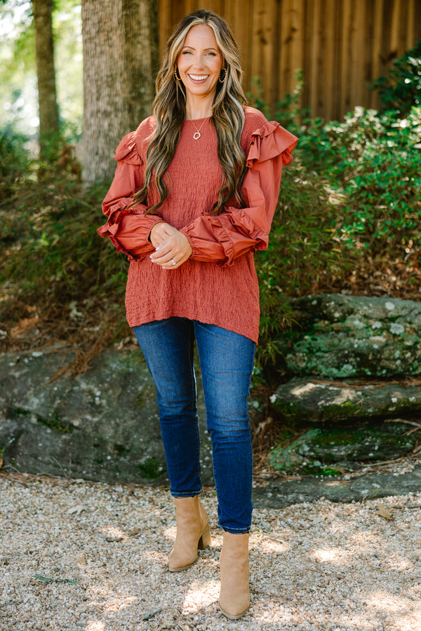Chic Soul plus size clothing, rust colored long sleeve top with ruffle details on the sleeves and shoulders