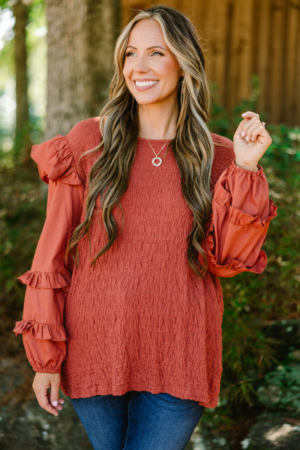 Chic Soul plus size clothing, rust colored long sleeve top with ruffle details on the sleeves and shoulders