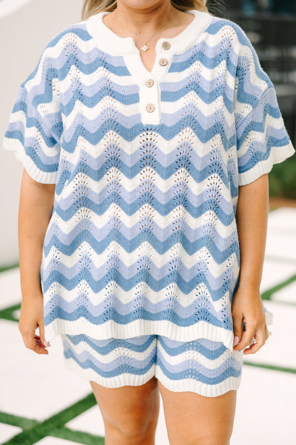 Chic soul plus size clothing, blue woven short set with a short sleeve top and both have a blue woven wavey pattern as well as the top having a button -up neckline 