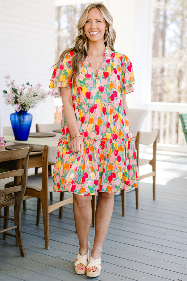 Plus Size pink v-neck dress with a colorful tulip print and layered flutter sleeves.