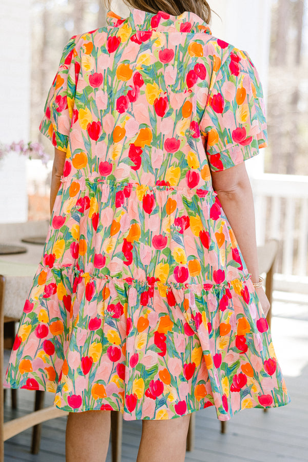 Plus Size pink v-neck dress with a colorful tulip print and layered flutter sleeves.