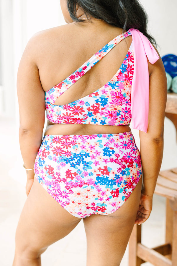 Plus Size one-shoulder fuchsia floral bikini top with a pink tie strap and matching high-waist bottoms.