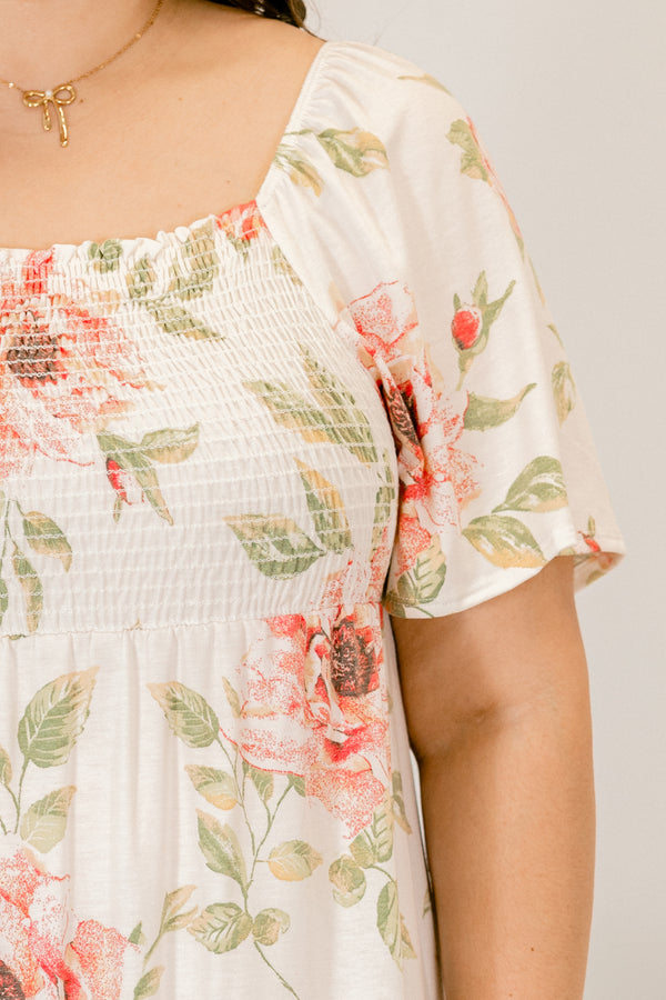 Plus Size ivory floral dress with a smocked bust, square neckline, and short sleeves.